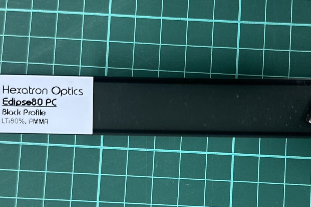 Black diffuser for LED lighting panels and fixtures