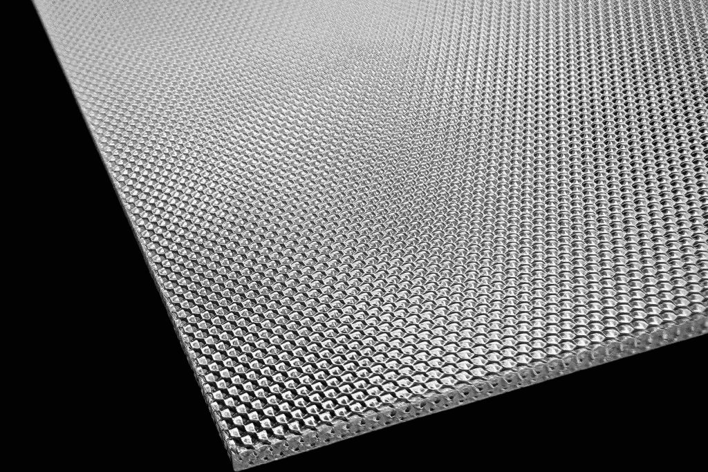 Convex micro hexagon prismatic sheet for LED lighting diffusion