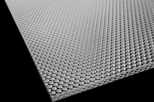 Concave hexagon prismatic sheet for LED lighting diffusion and glare control