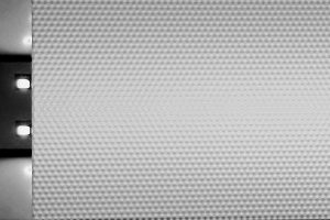 Plexi85 concave hexagon prismatic polycarbonate sheet with 85% light transmission illuminated by LED backlight