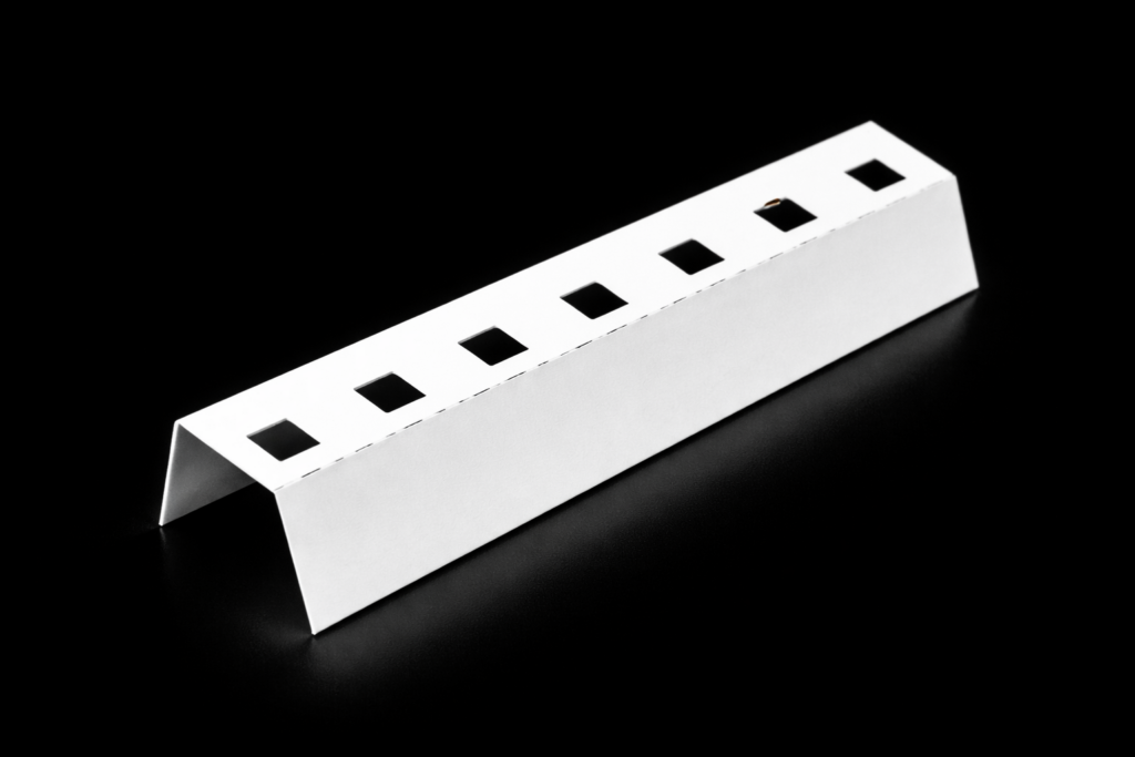 White reflector film folded cleanly along scored lines without cracking
