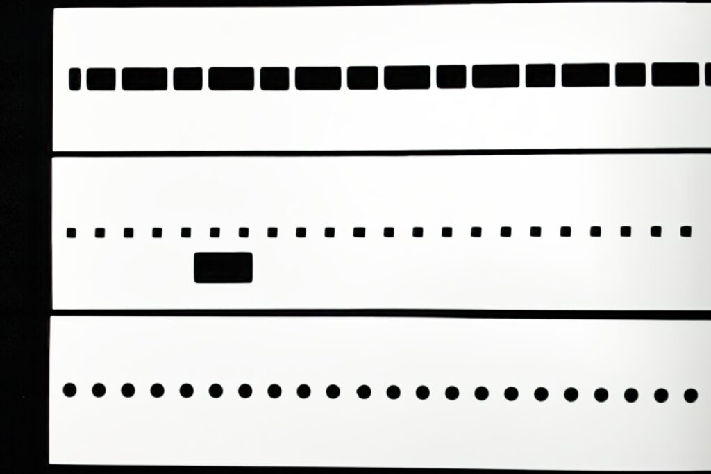 Precision-slit white reflector film strips in narrow custom widths